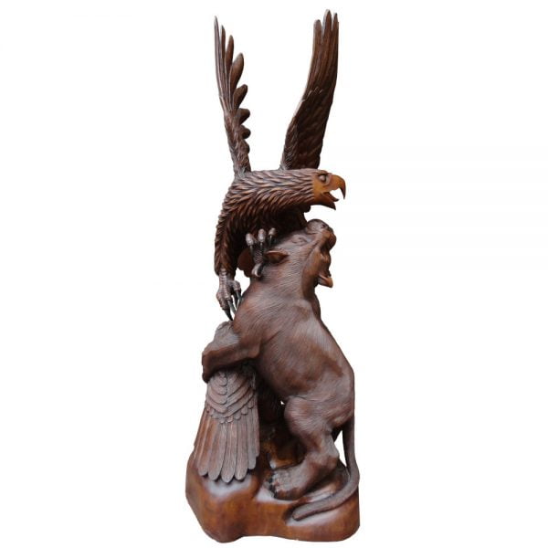 Eagle wood carving of 2 eagles fighting a lion - Indonesian Wood carving